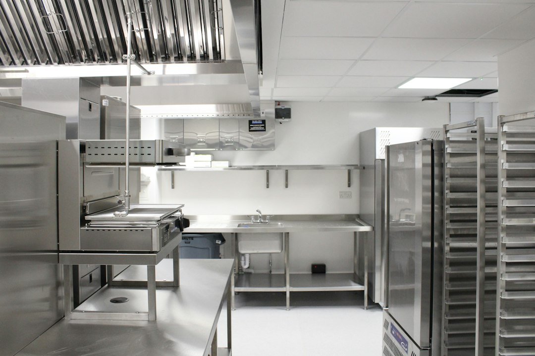 Commercial restaurant back-of-house storage and kitchen area used for controlled inventory transfers between locations