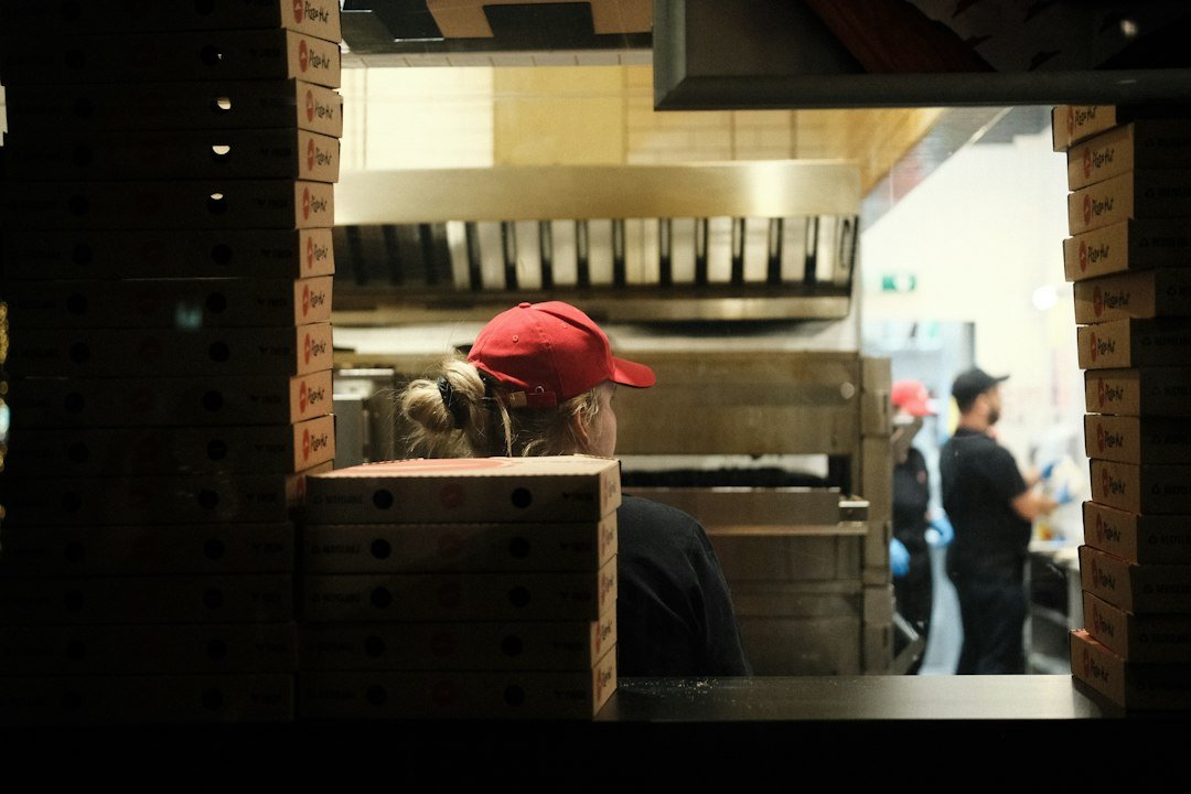 Restaurant supplier delivery boxes in a commercial kitchen receiving area